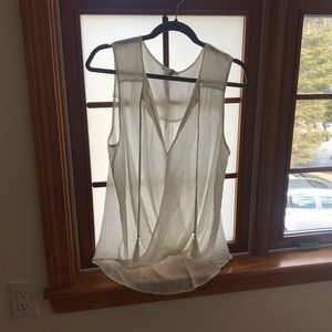 Sheer, sleeveless top